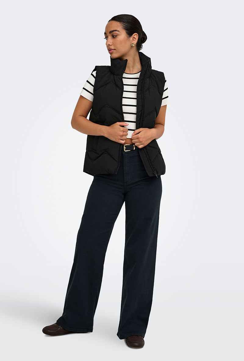 Front image of a model wearing Power short waistcoat in black, by brand Jacqueline de yong