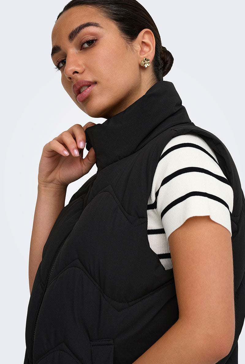 Front image of a model wearing Power short waistcoat in black, by brand Jacqueline de yong