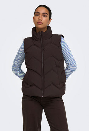 Front image of a model wearing Power short waistcoat in chocolate, by brand Jacqueline de yong