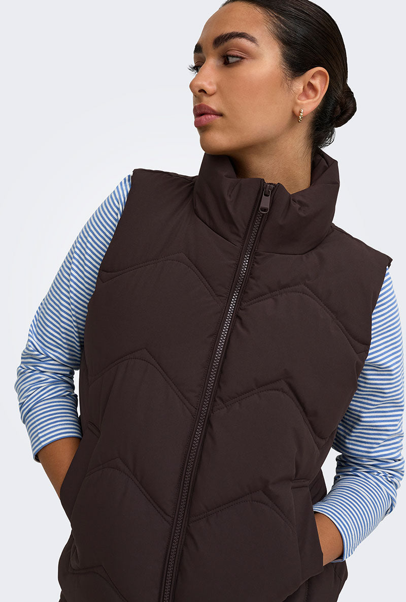 Front image of a model wearing Power short waistcoat in chocolate, by brand Jacqueline de yong
