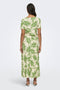 Back image of a model wearing the Sezen life s/s knot shrit in green, by brand Jacqueline de yong