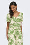 Front image of a model wearing the Sezen life s/s knot shrit in green, by brand Jacqueline de yong