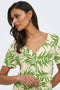 Front image of a model wearing the Sezen life s/s knot shrit in green, by brand Jacqueline de yong