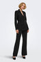Front image of a model wearing the Storm ls buckle blazer in black, by brand Jacqueline de yong
