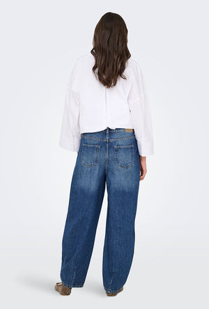 Back image of a model wearing the Susie mw barrel jeans in denim, by brand Jacqueline de yong