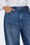 Front image of a model wearing the Susie mw barrel jeans in denim, by brand Jacqueline de yong