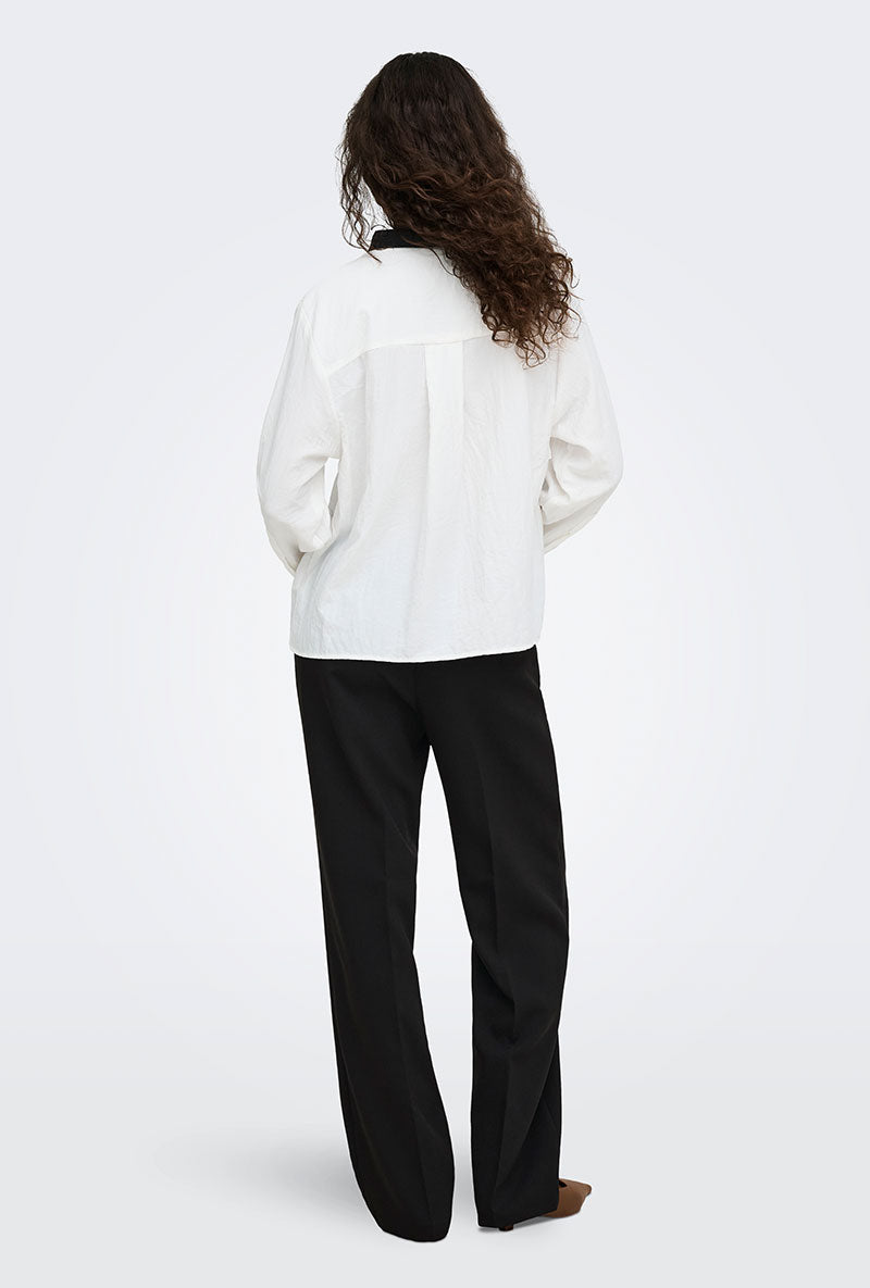 Back image of a model wearing Viv hw wide pants in black, by brand Jacqueline de yong