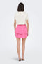 Back image of a model wearing the Theis life hw smock skirt in pink, by brand Jacqueline de yong