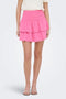 Front image of a model wearing Theis life hw smock skirt in pink, by brand Jacqueline de yong