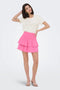Front image of a model wearing the Theis life hw smock skirt in pink, by brand Jacqueline de yong