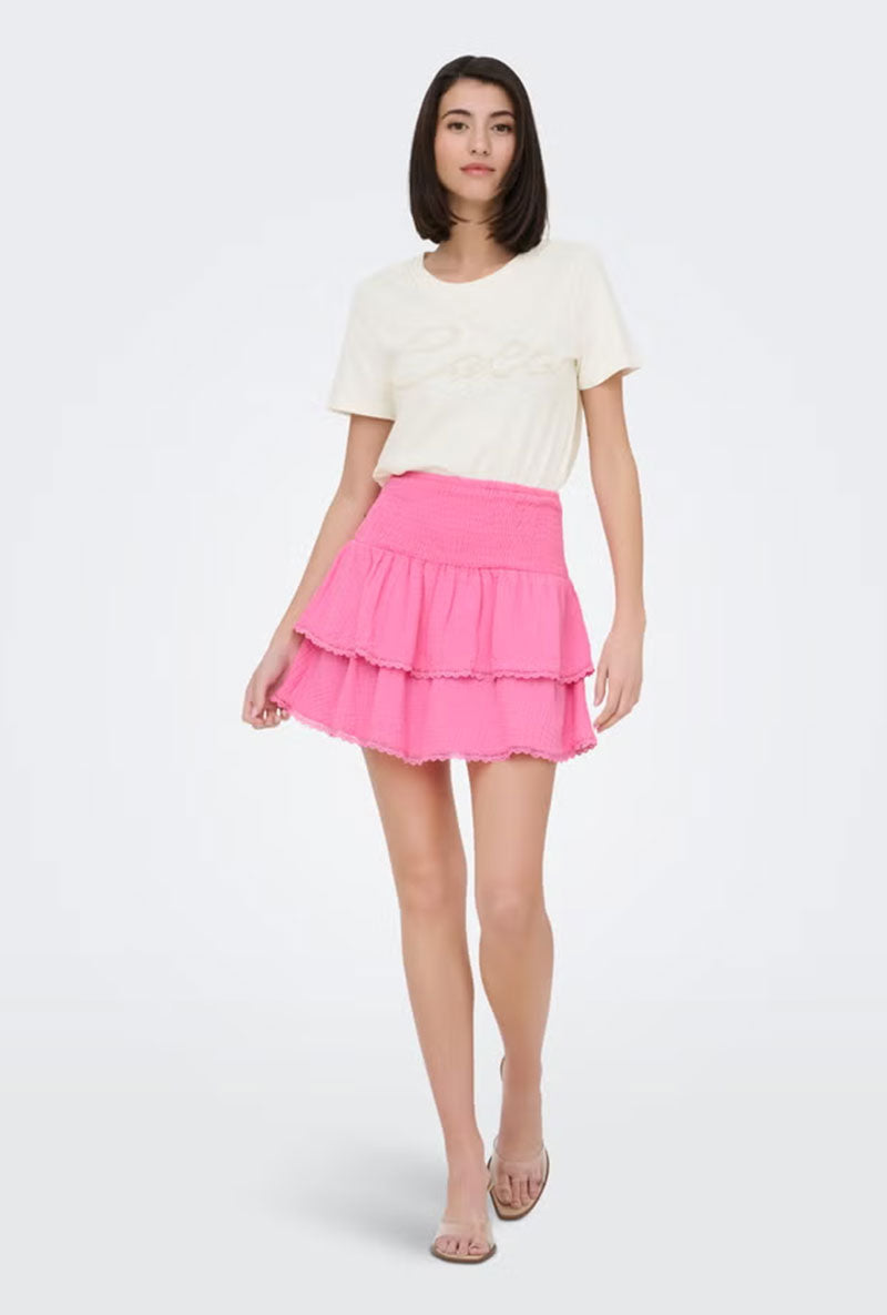 Front image of a model wearing Theis life hw smock skirt in pink, by brand Jacqueline de yong