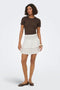 Front image of a model wearing the Theis life hw smock skirt in white, by brand Jacqueline de yong