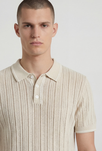 Front image of a model wearing the Deep river button knit polo in beige, by brand Deep
