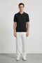 Black of Deep rory open neck polo in black, by brand Deep
