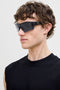 Front image of a model wearing Wilson sunglasses in black, by brand Jack&jones