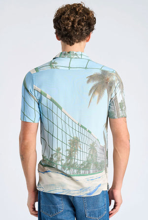 Back image of a model wearing the Aop summer viscose shirt in sky, by brand Lindbergh