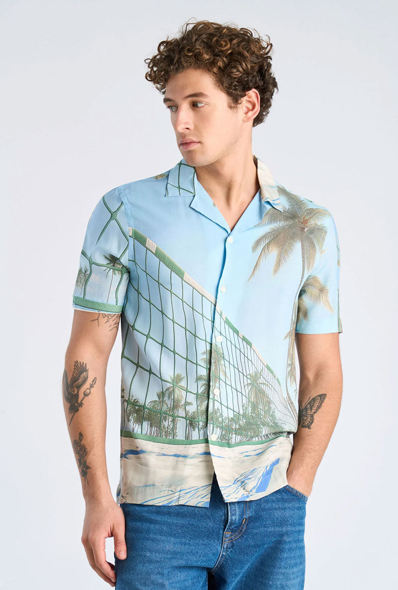 Front image of a model wearing Aop summer viscose shirt in sky, by brand Lindbergh