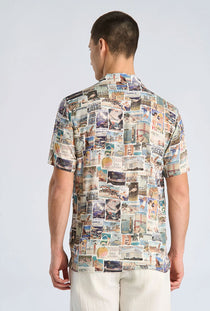 Back image of a model wearing the Aop vintage shirt in all over print, by brand Lindbergh