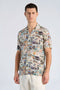 Front image of a model wearing Aop vintage shirt in all over print, by brand Lindbergh