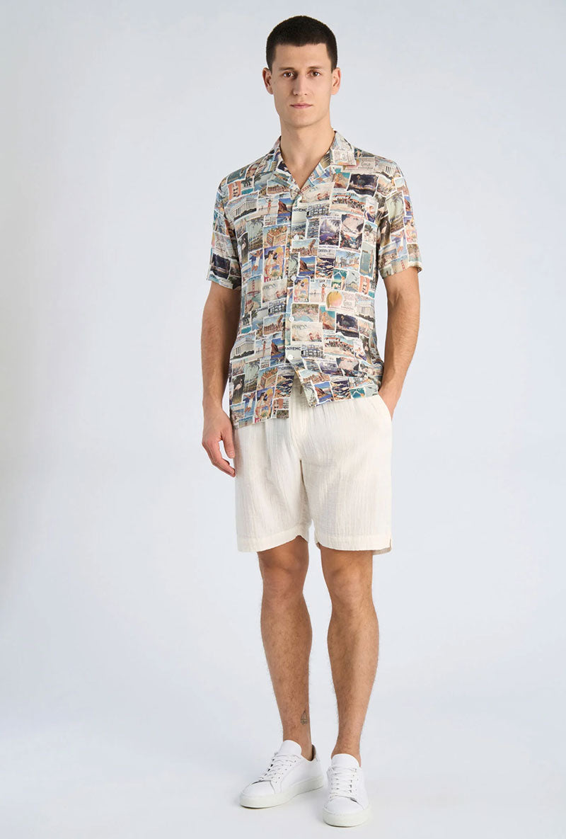 Front image of a model wearing Aop vintage shirt in all over print, by brand Lindbergh