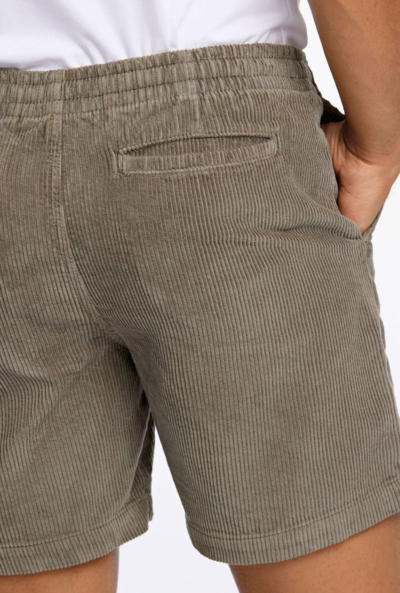 Back image of a model wearing Corduroy relaxed fit shorts in khaki, by brand Lindbergh