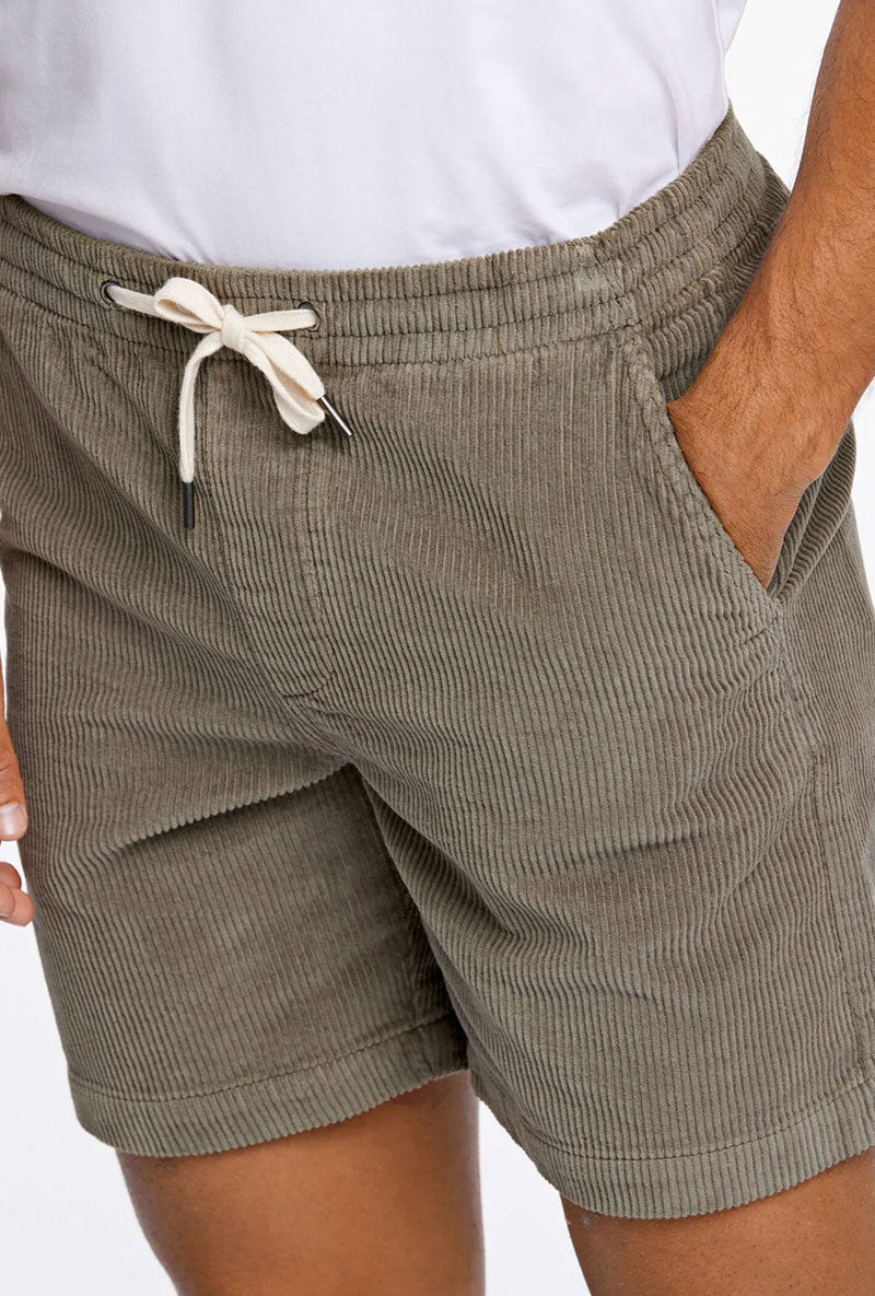 Front image of a model wearing Corduroy relaxed fit shorts in khaki, by brand Lindbergh