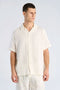Front image of a model wearing Cotton muslin resort shirt in off white, by brand Lindbergh