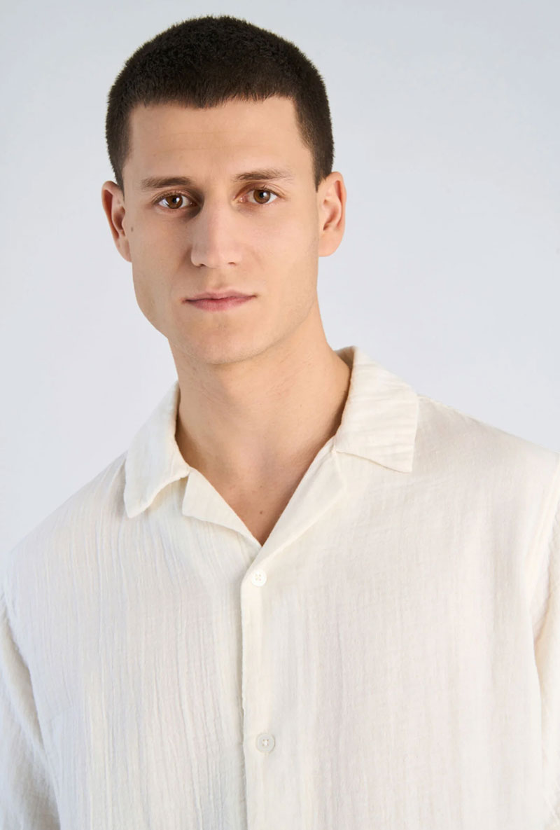 Front image of a model wearing Cotton muslin resort shirt in off white, by brand Lindbergh