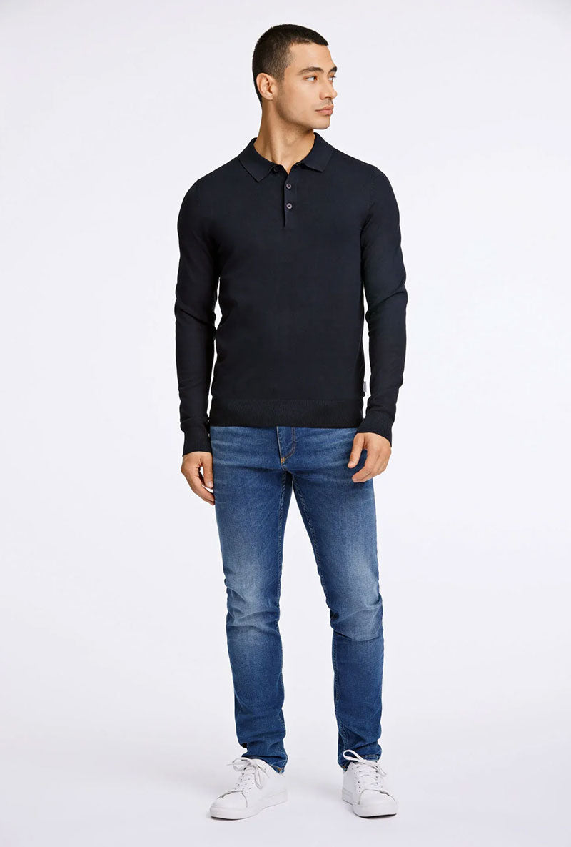 Front image of a model wearing Lindbergh ecovero l/s zip polo in navy, by brand Lindbergh