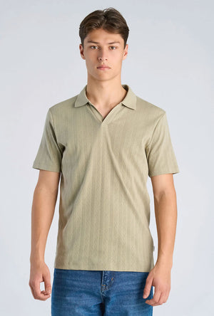 Front image of a model wearing the Jacquard vneck polo in olive, by brand Lindbergh