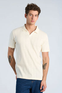 Front image of a model wearing the Jacquard vneck polo in off white, by brand Lindbergh