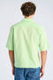 Back image of a model wearing the Linen blend cropped shirt in green, by brand Lindbergh