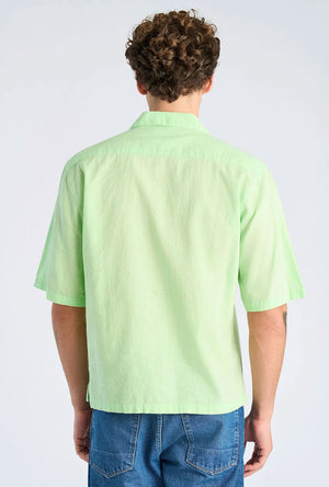 Back image of a model wearing the Linen blend cropped shirt in green, by brand Lindbergh