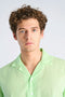 Front image of a model wearing the Linen blend cropped shirt in green, by brand Lindbergh