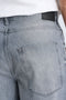Back image of a model wearing the Loose fit denim shorts in grey, by brand Lindbergh