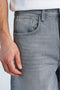 Front image of a model wearing the Loose fit denim shorts in grey, by brand Lindbergh