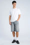 Front image of a model wearing the Loose fit denim shorts in grey, by brand Lindbergh