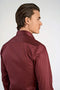 Back image of a model wearing the Plain sateen superlflex shirt in burgundy, by brand Lindbergh