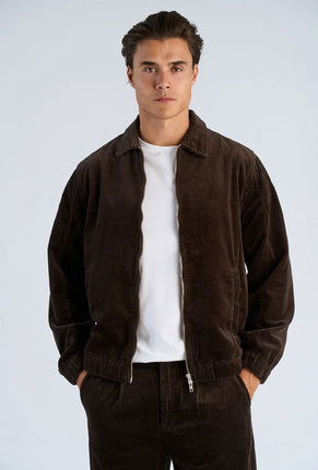 Front image of a model wearing Seersucker corduroy zip jacket in brown, by brand Lindbergh