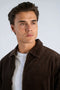 Front image of a model wearing the Seersucker corduroy zip jacket in brown, by brand Lindbergh
