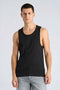Front image of a model wearing Slim fit tank top in black, by brand Lindbergh