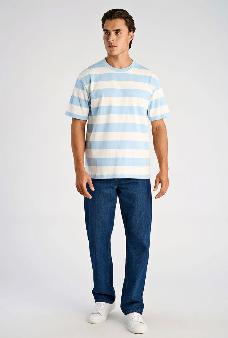 Front image of a model wearing Striped oversized t in blue, by brand Lindbergh