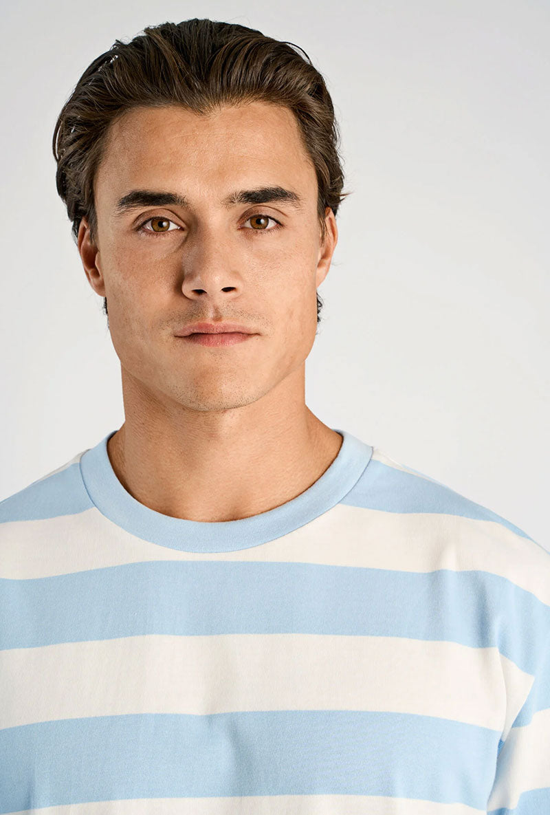 Front image of a model wearing Striped oversized t in blue, by brand Lindbergh