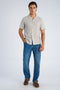 Front image of a model wearing the Striped seersucker shirt in stripe, by brand Lindbergh