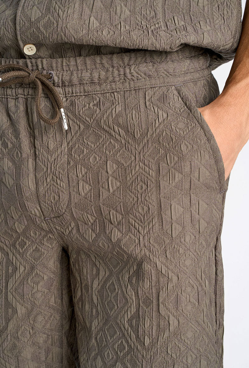 Front image of a model wearing Textured shorts in khaki, by brand Lindbergh