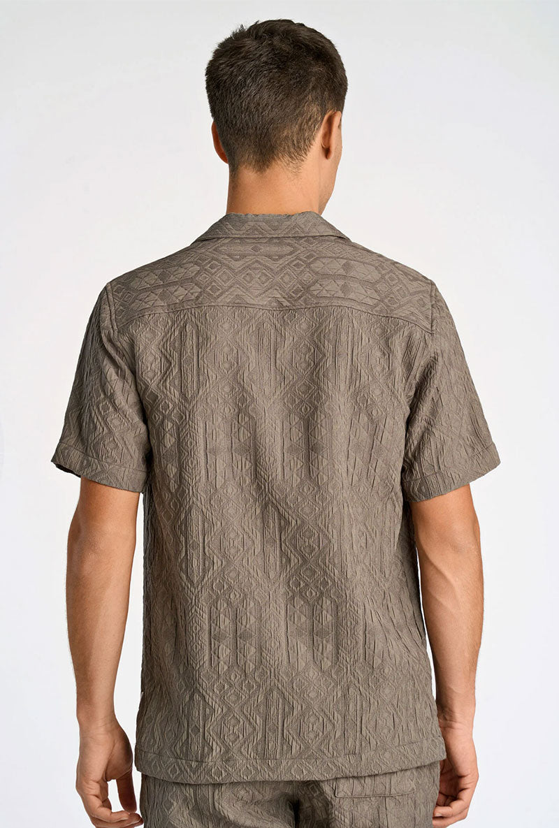 Back image of a model wearing Textured ss shirt in khaki, by brand Lindbergh