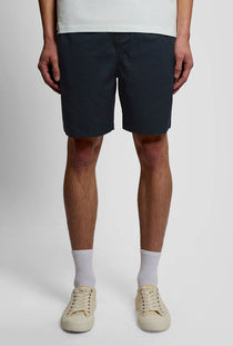 Front image of a model wearing the Everyday shorts in navy, by brand Lyle and scott