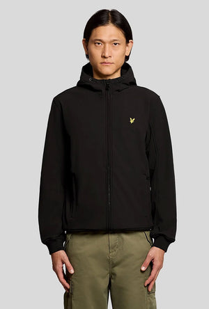 Front image of a model wearing the Fleece back softshell jacket in black, by brand Lyle and scott