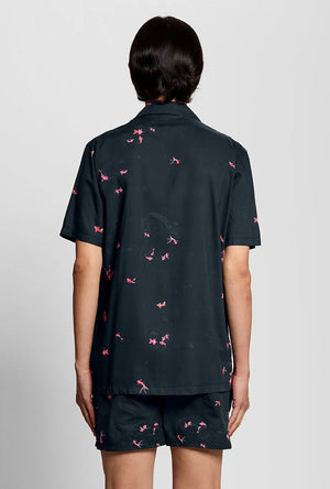 Back image of a model wearing the Goldfish resort shirt in navy, by brand Lyle and scott