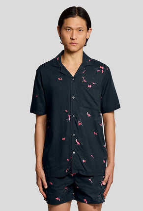 Front image of a model wearing Goldfish resort shirt in navy, by brand Lyle and scott